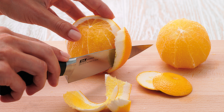 Peel orange Peel the skin off the orange all round in strips